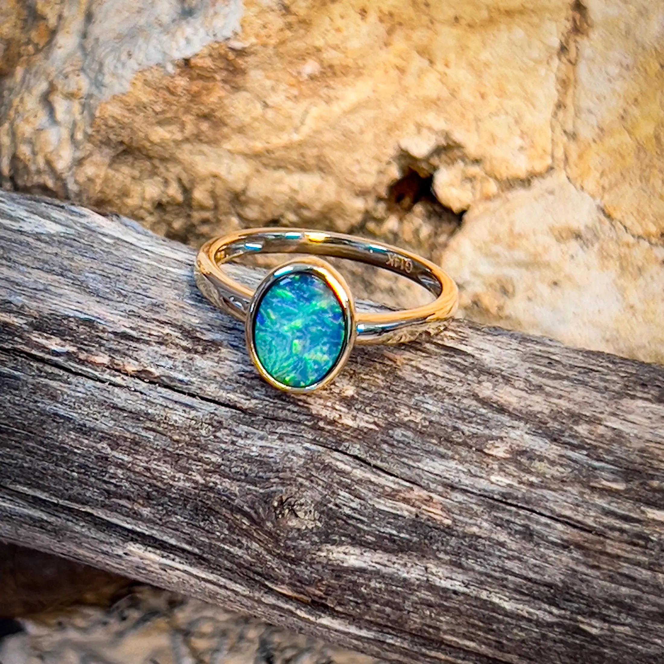 14kt Yellow Gold Black Opal 1.11ct bezel set ring