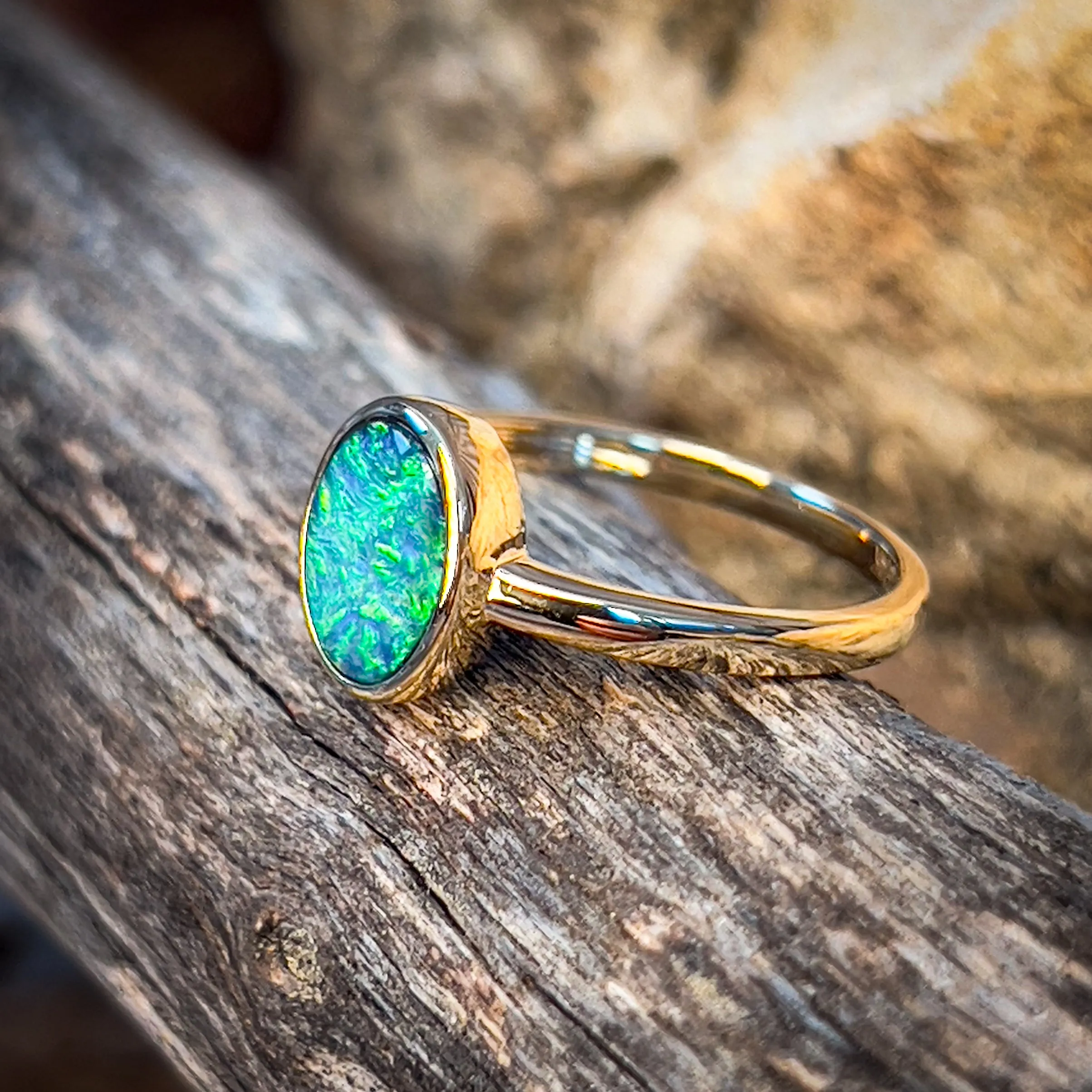 14kt Yellow Gold Black Opal 1.11ct bezel set ring