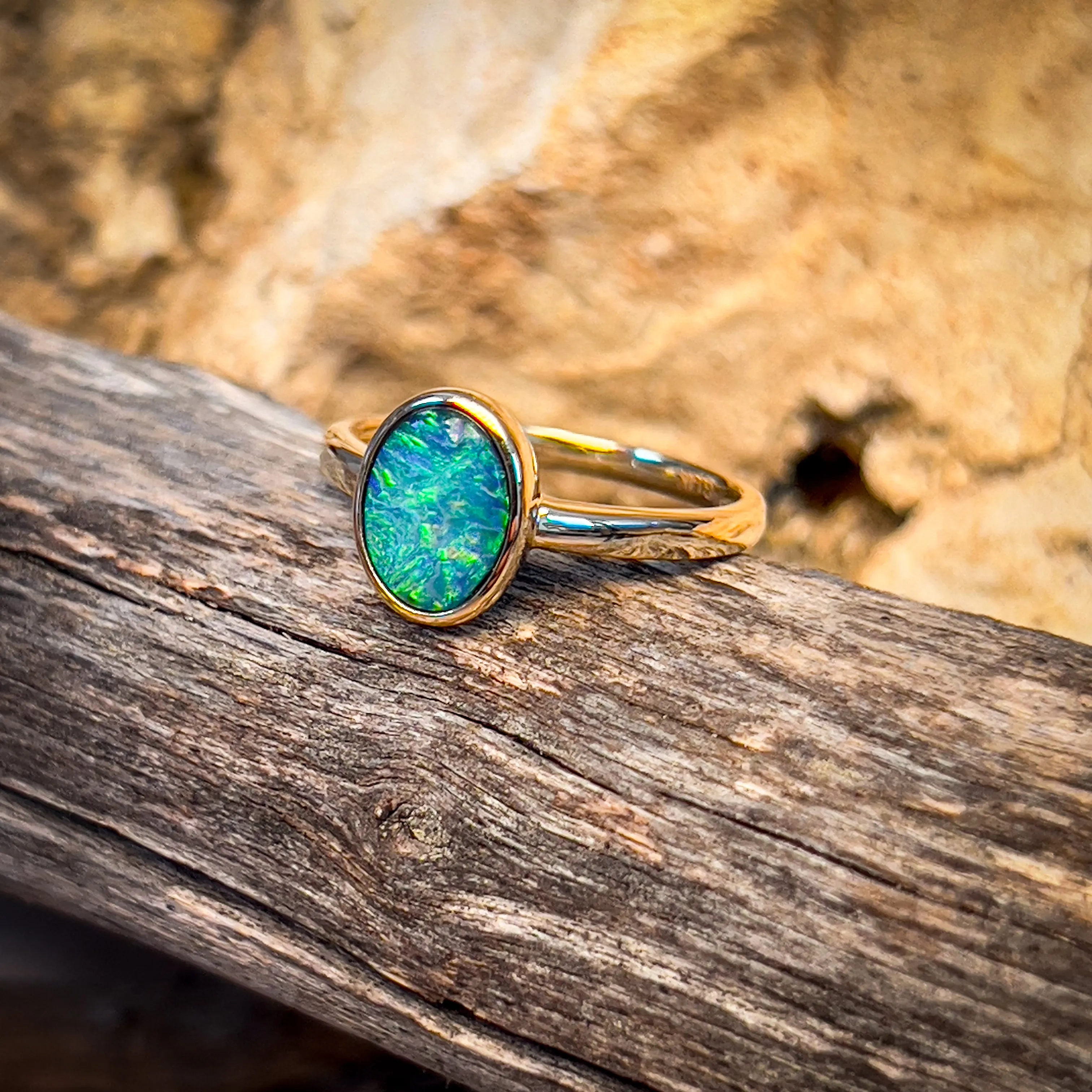 14kt Yellow Gold Black Opal 1.11ct bezel set ring