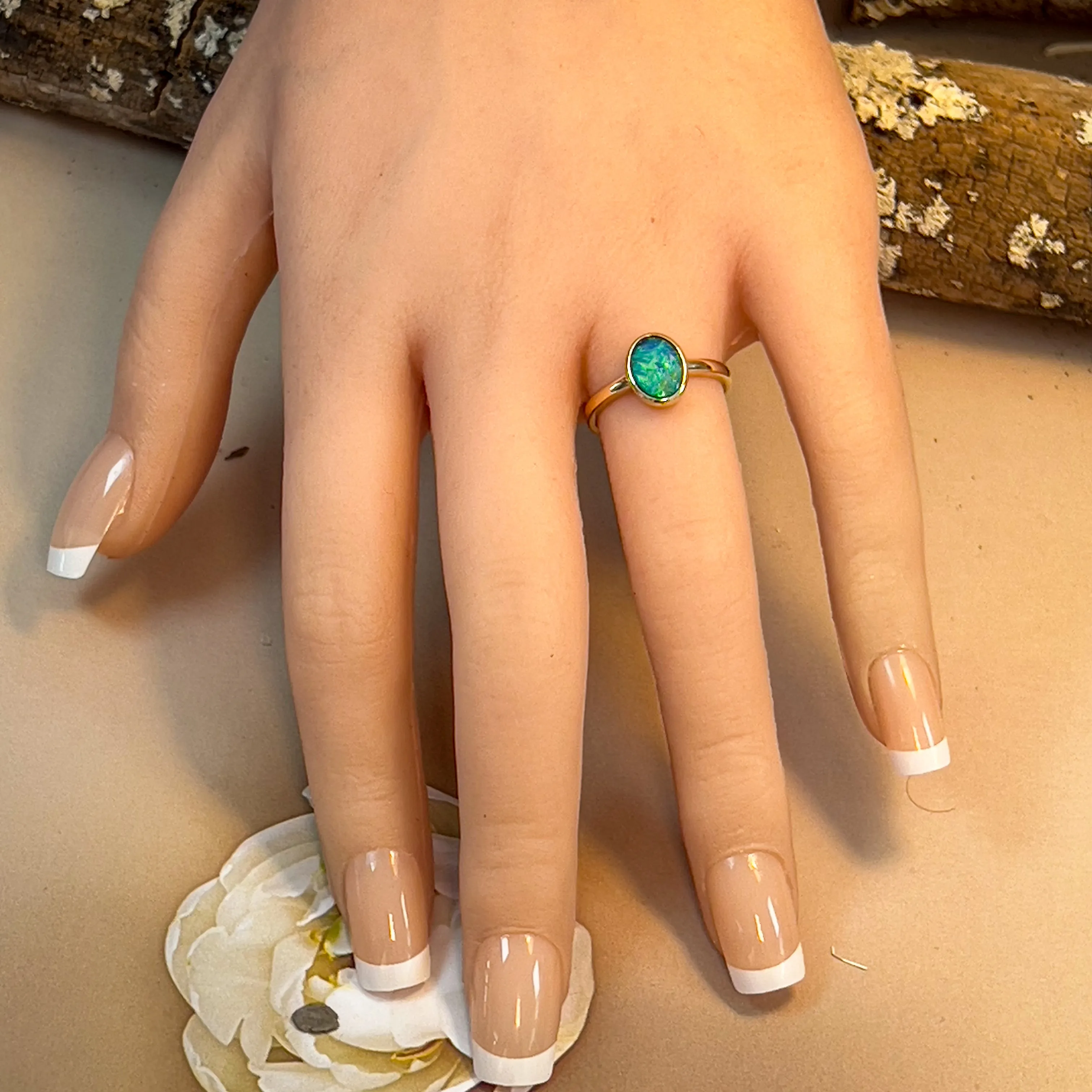 14kt Yellow Gold Black Opal 1.11ct bezel set ring