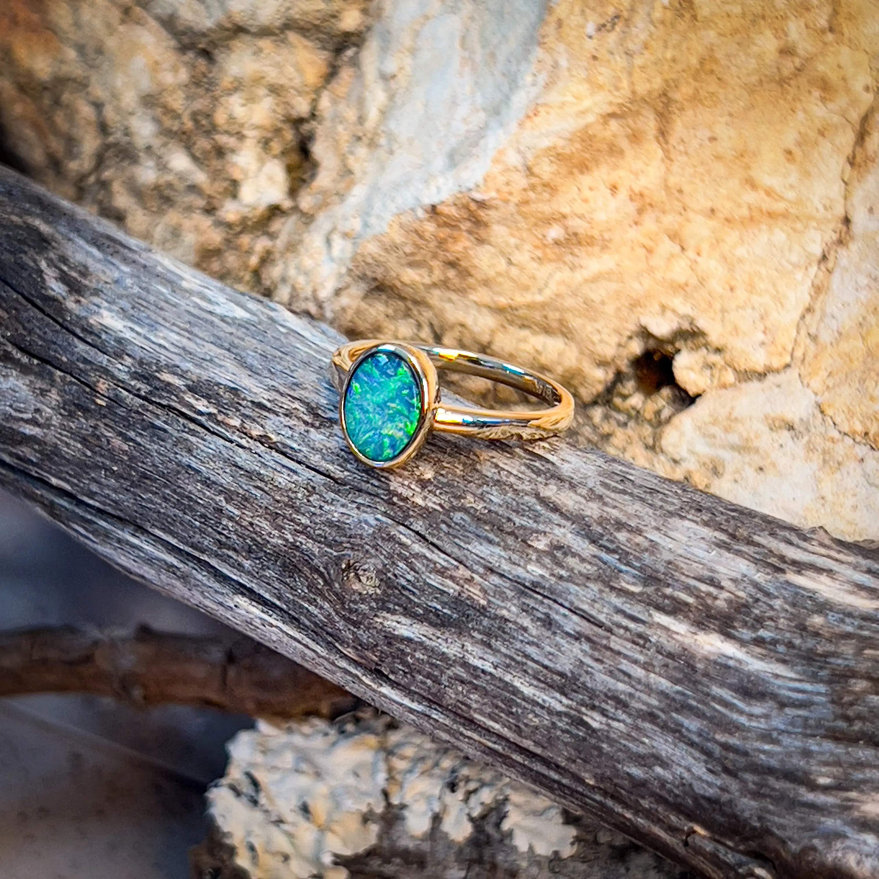 14kt Yellow Gold Black Opal 1.11ct bezel set ring