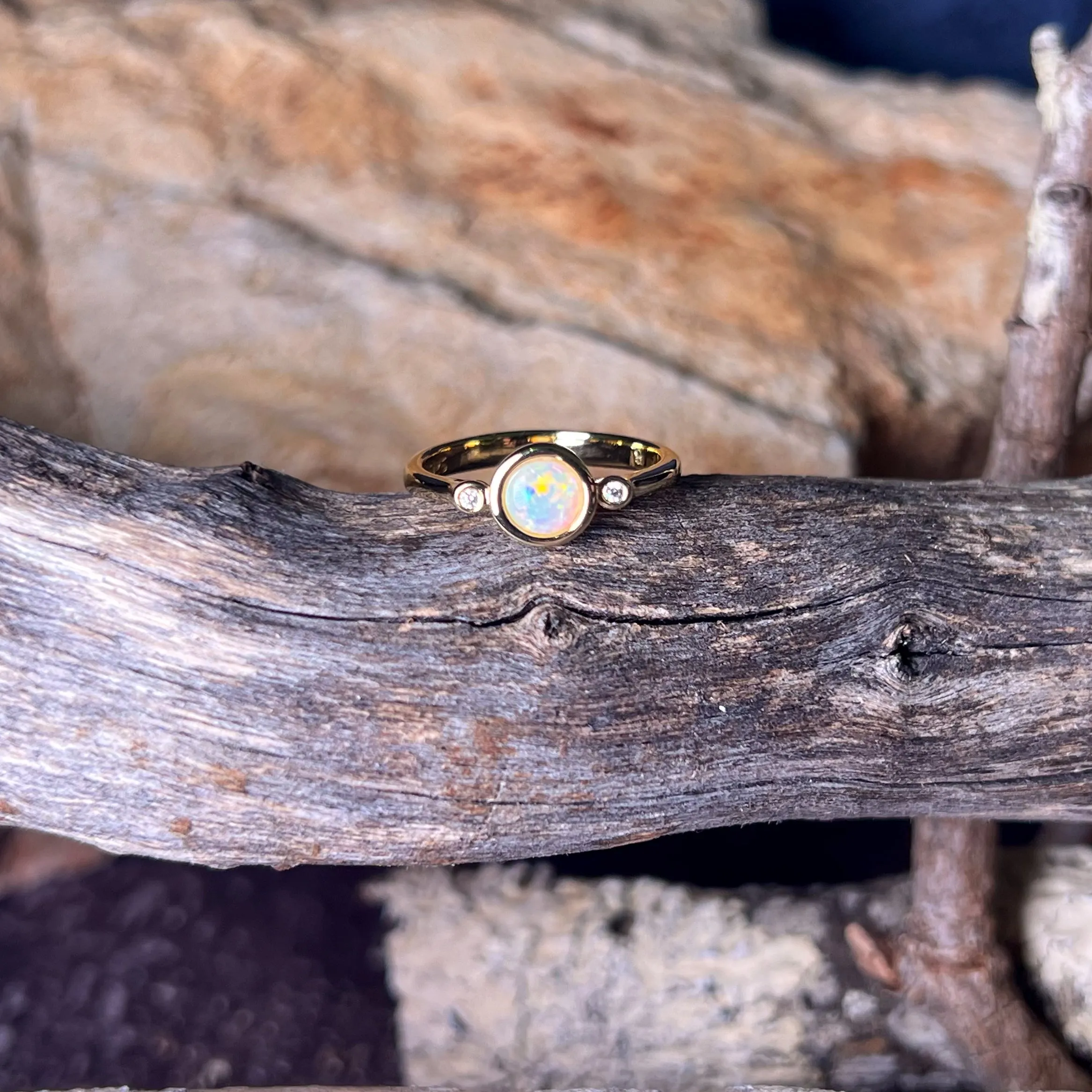 Gold Plated Sterling Silver White Opal 6mm round and two cubic zirconia ring