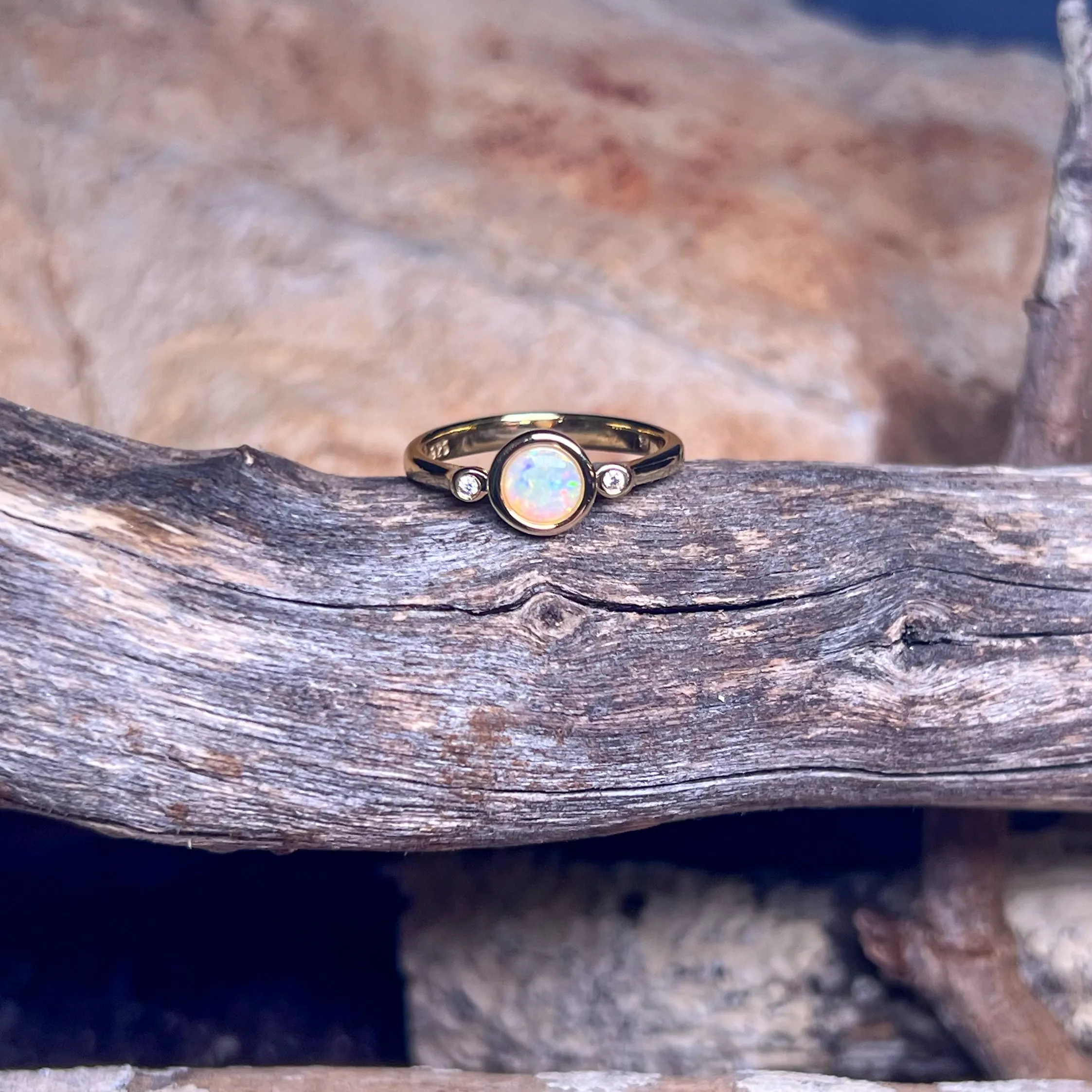 Gold Plated Sterling Silver White Opal 6mm round and two cubic zirconia ring