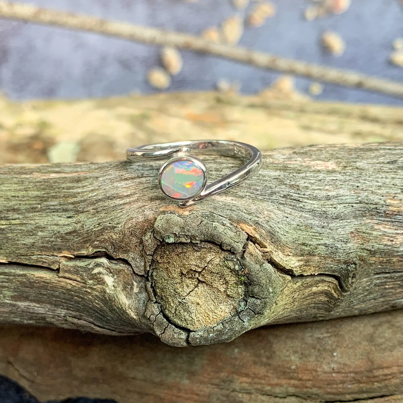 Sterling Silver cross over black opal ring solitaire