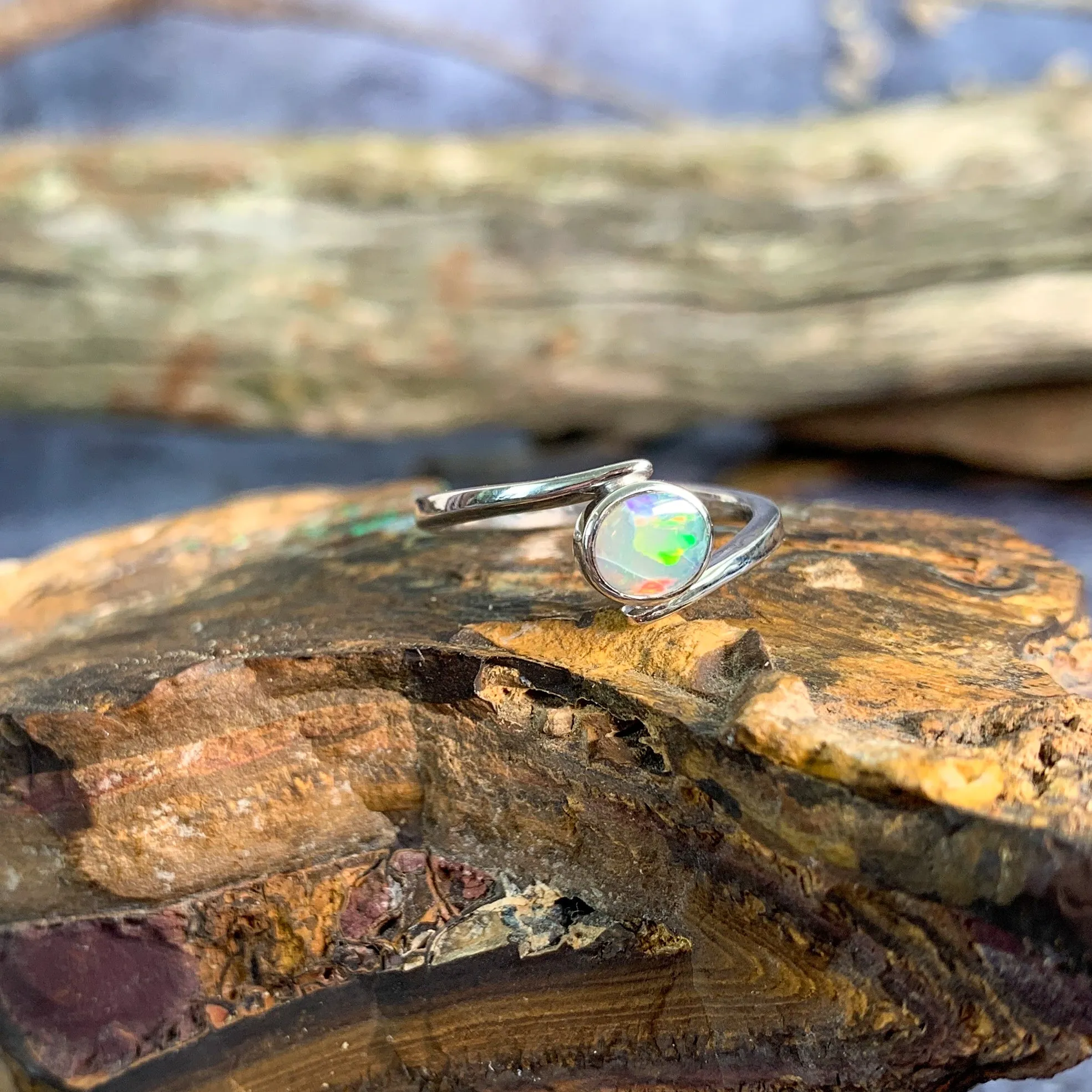 Sterling Silver cross over black opal ring solitaire