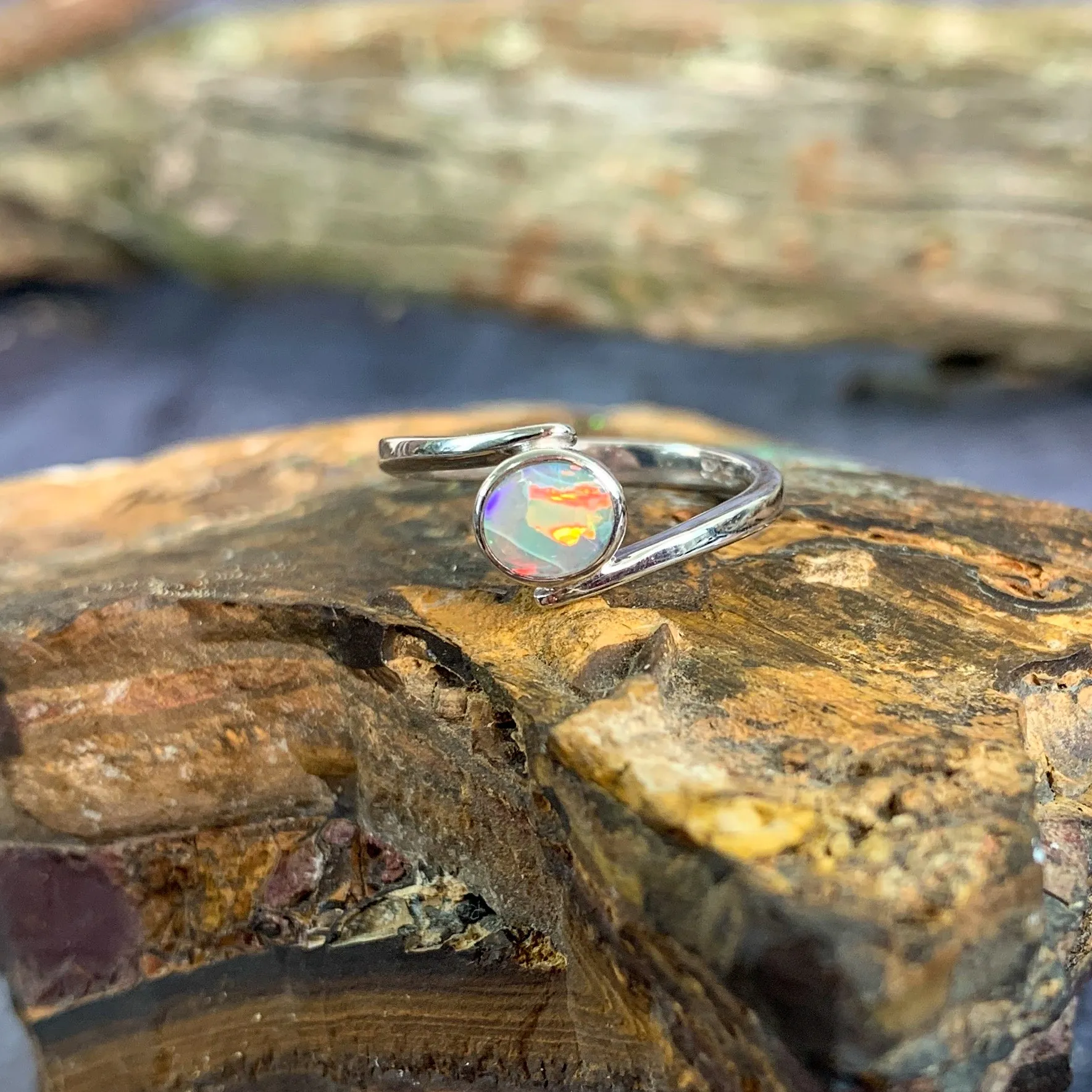Sterling Silver cross over black opal ring solitaire