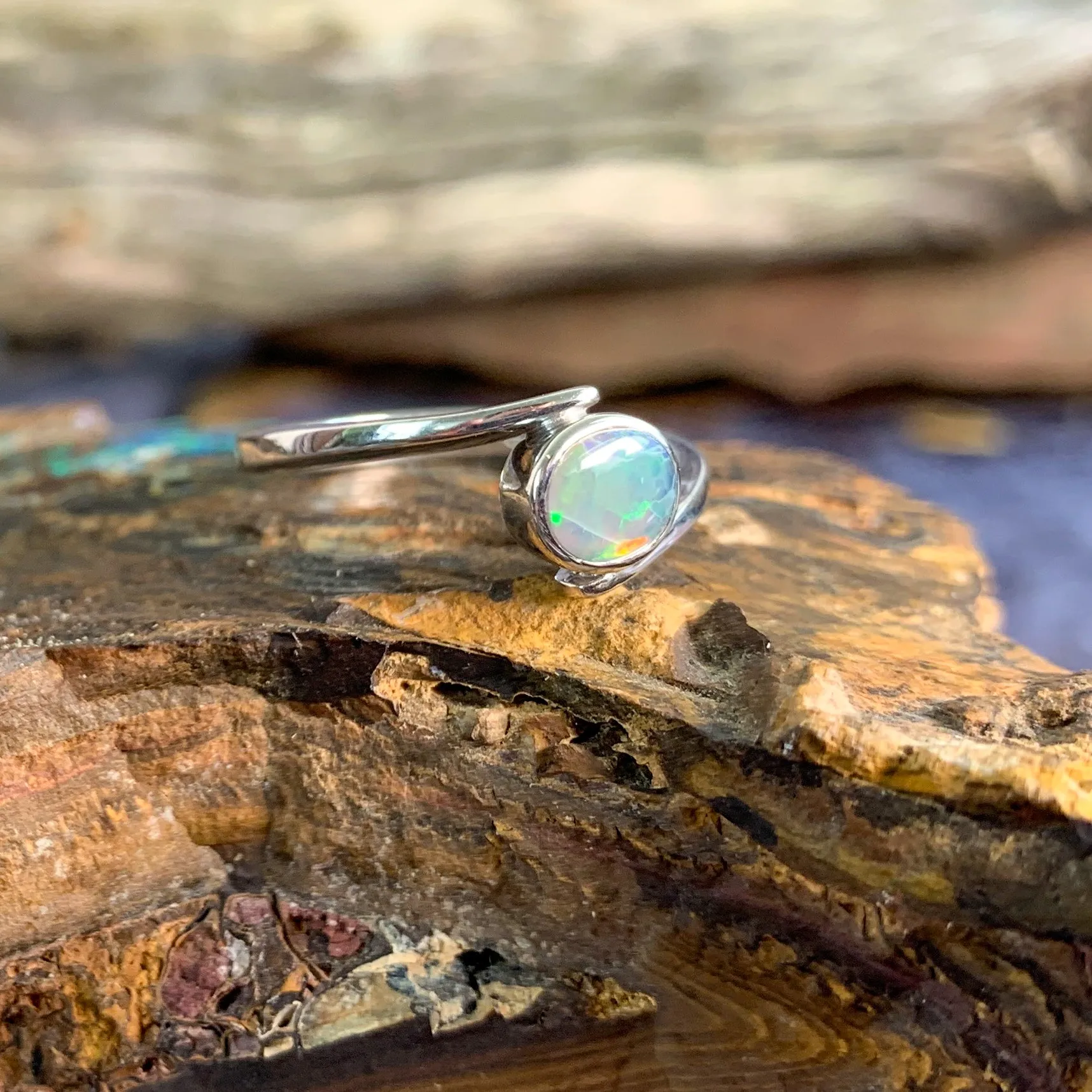 Sterling Silver cross over black opal ring solitaire