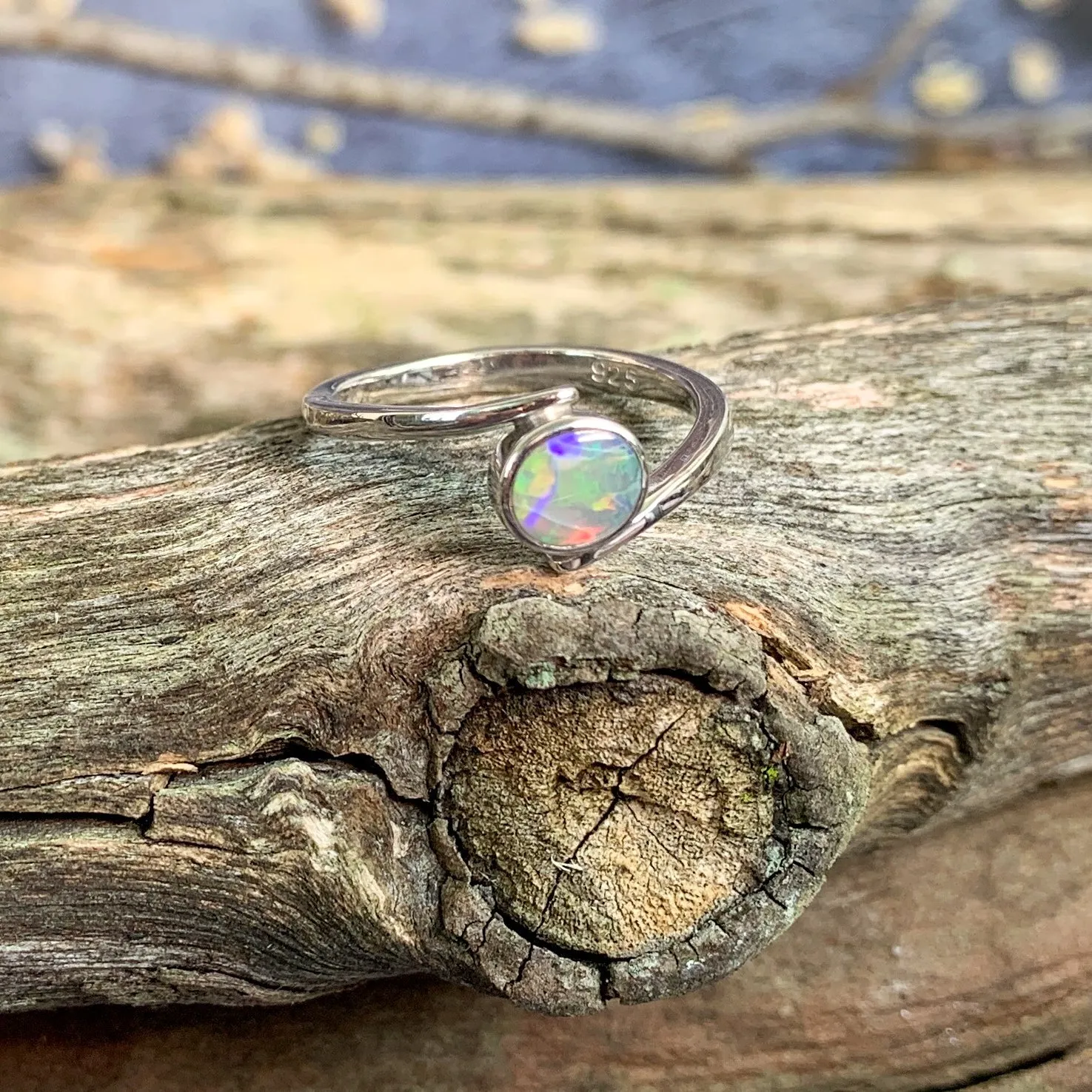 Sterling Silver cross over black opal ring solitaire