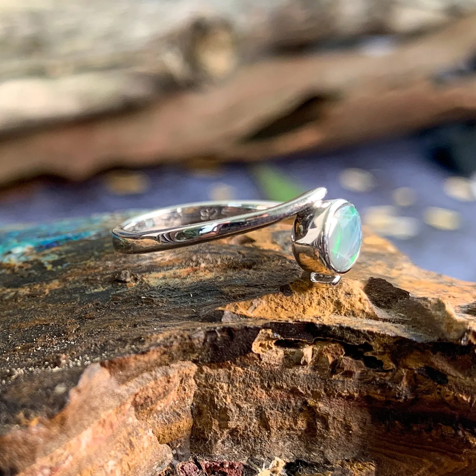Sterling Silver cross over black opal ring solitaire